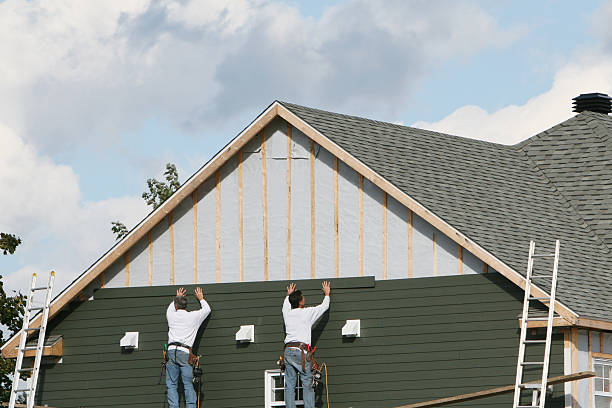 Professional Siding technician working in Disputanta, VA